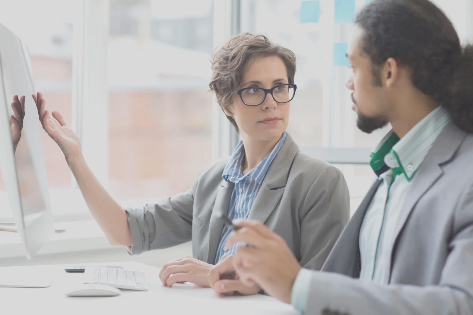 Business financial planning workspace with documents and calculator